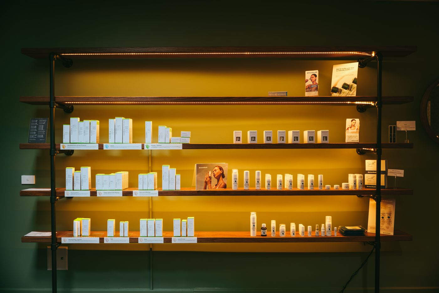 Dermaviduals products on lit shelves