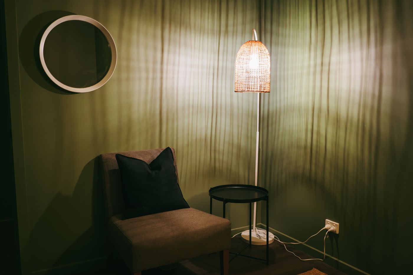 Quiet relaxation corner with armchair and lamp